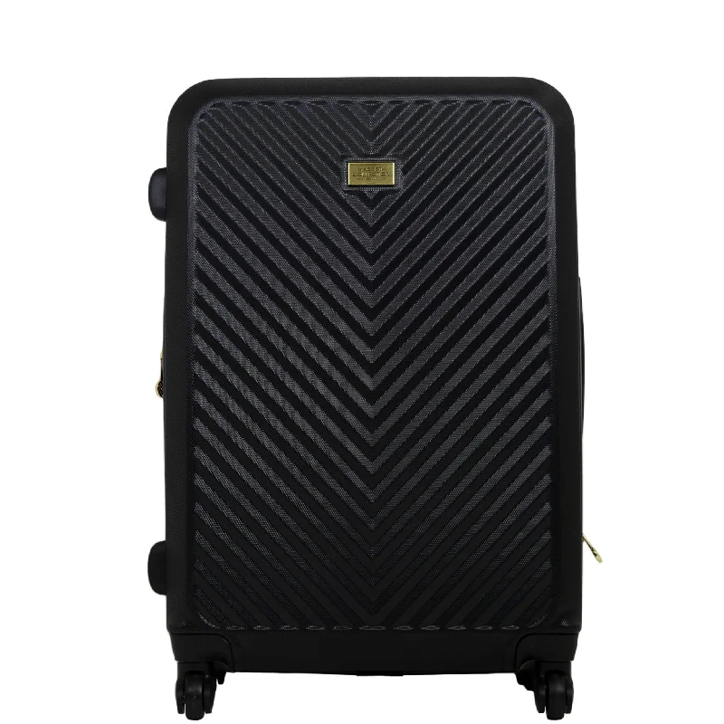 mid-size suitcase for mid trips -Macbeth Collection Women's Black Molded Quilt 27in Rolling Luggage