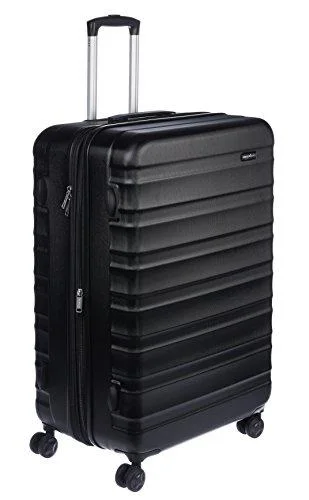 soft suitcase for easy packing -Amazonbasics Hardside Spinner Luggage - 28-Inch, Black